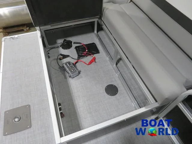 Slide: The Image of 2025 Princecraft Vectra 23 RL pontoon storage compartment with battery and wiring. - 22