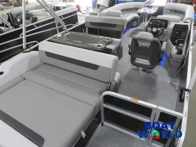 Slide: The Image of 2025 Princecraft Vectra 23 RL pontoon boat interior with modern seating and controls. - 24