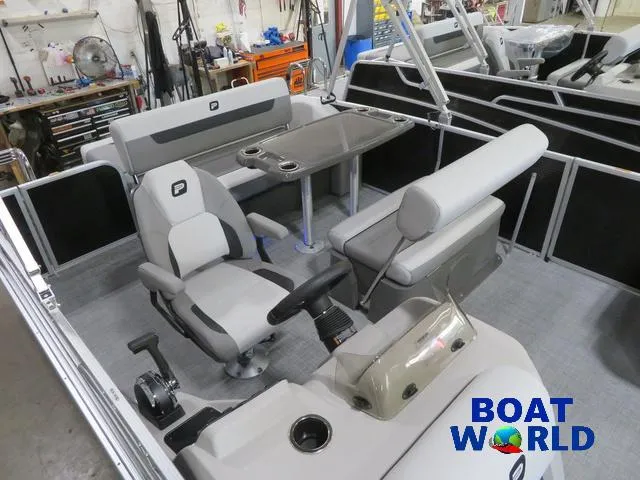 Slide: The Image of 2025 Princecraft Vectra 23 RL pontoon with dinette, swingback seating, and Mercury engine. - 3