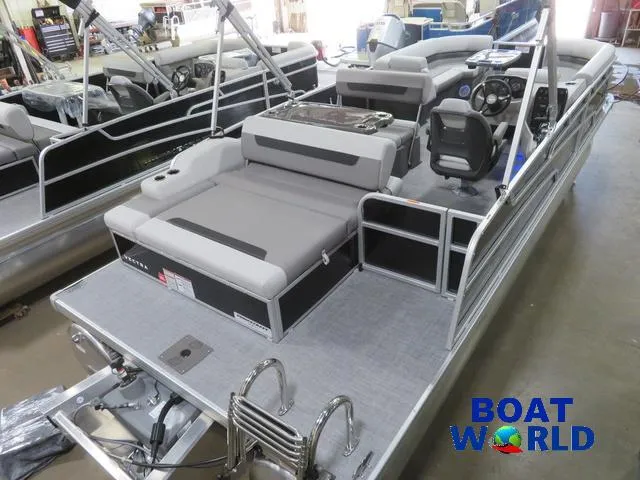 Slide: The Image of 2025 Princecraft Vectra 23 RL Swingback Dinette Pontoon with Mercury engine, showcased indoors. - 33