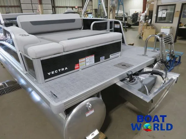 Slide: The Image of 2025 Princecraft Vectra 23 RL pontoon boat in showroom, featuring swingback dinette. - 37