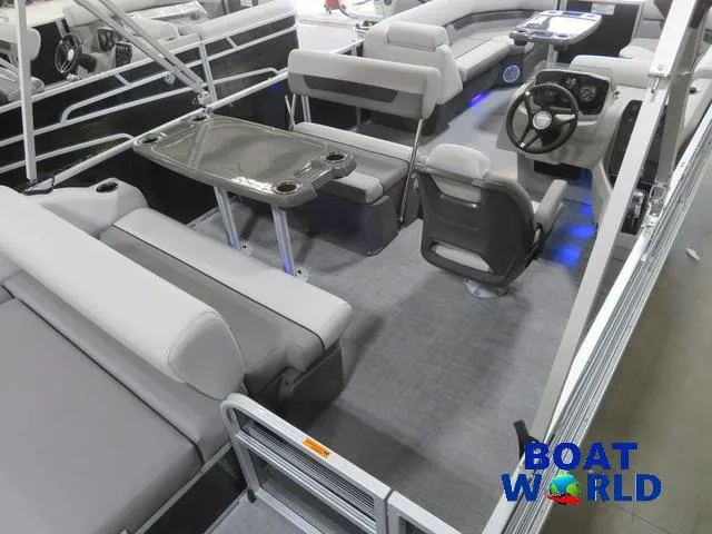 Slide: The Image of 2025 Princecraft Vectra 23 RL pontoon boat interior with seating and steering console. - 4