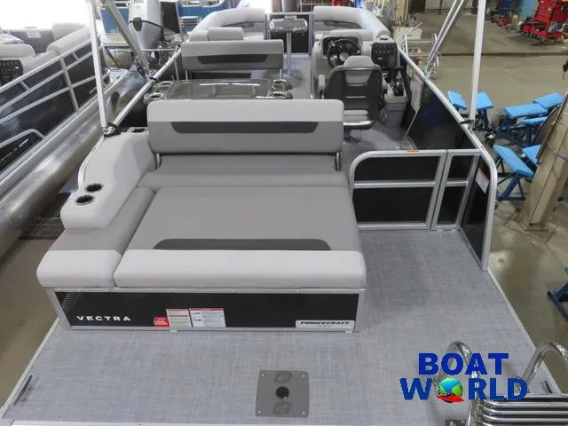 Slide: The Image of 2025 Princecraft Vectra 23 RL pontoon boat interior with seating and controls. - 6