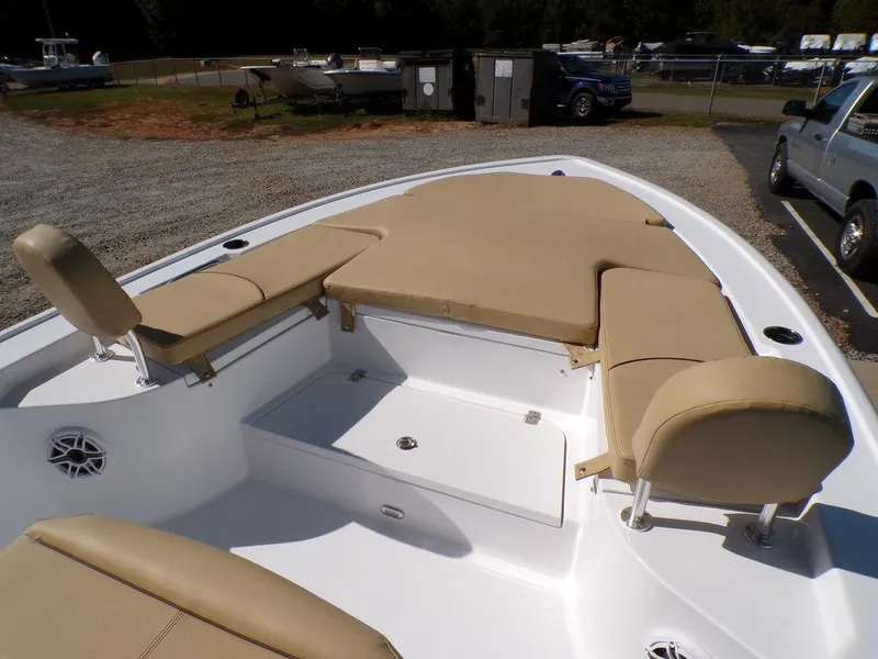 Slide: The Image of 2025 Sportsman Masters 247 boat with beige seating and spacious deck layout. - 12