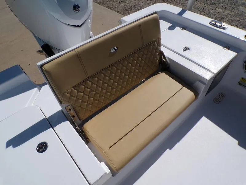 Slide: The Image of 2025 Sportsman Masters 247 boat seat with tan upholstery and diamond stitching. - 20