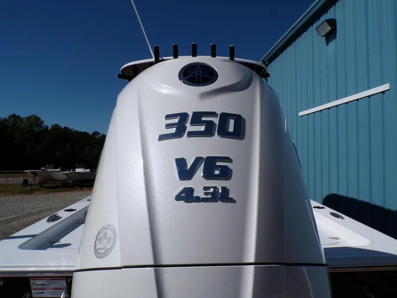 Slide: The Image of Outboard motor on a 2025 Sportsman Masters 247 boat, featuring 350 V6 4.3L engine. - 6