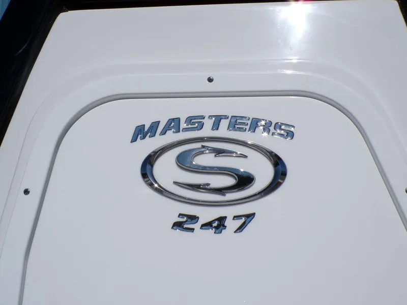 Slide: The Image of 2025 Sportsman Masters 247 boat logo on white surface. - 8