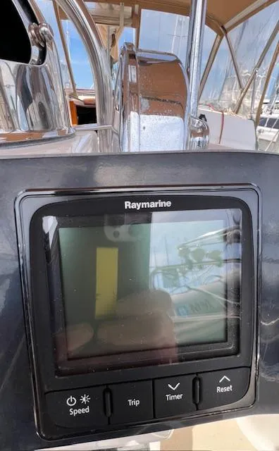 Slide: The Image of Raymarine navigation display on 1998 Tartan 4100 sailboat cockpit. - 15