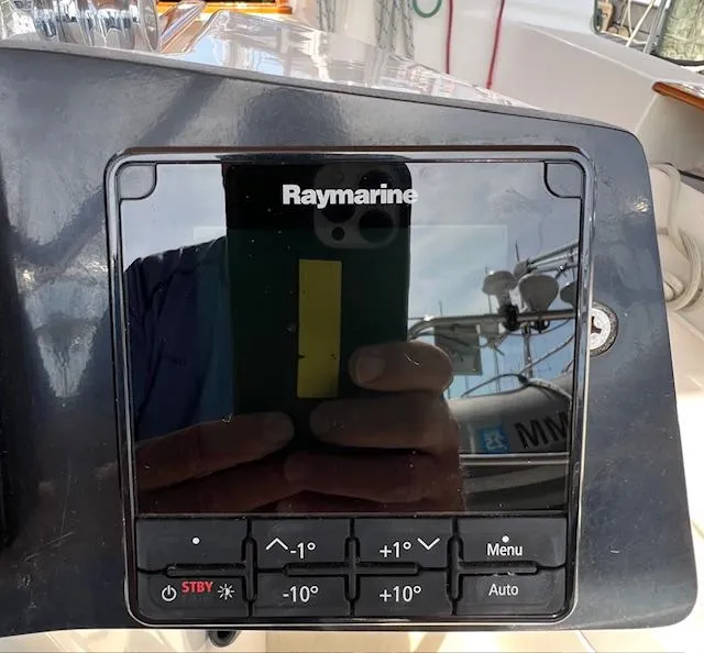 Slide: The Image of Raymarine navigation system on 1998 Tartan 4100 yacht dashboard. - 16