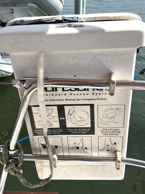 Slide: The Image of Tartan 4100 sailboat, 1998 model, featuring an overboard rescue system on deck. - 23