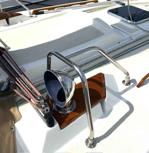 Slide: The Image of 1998 Tartan 4100 yacht deck with chrome fittings and winch. - 26