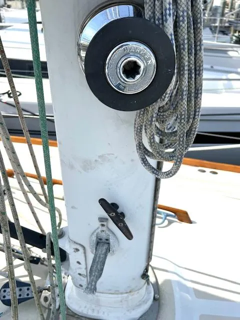 Slide: The Image of Close-up of a 1998 Tartan 4100 sailboat mast with ropes and winch. - 27