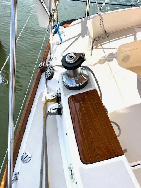 Slide: The Image of 1998 Tartan 4100 sailboat deck with winch and teak accents. - 35