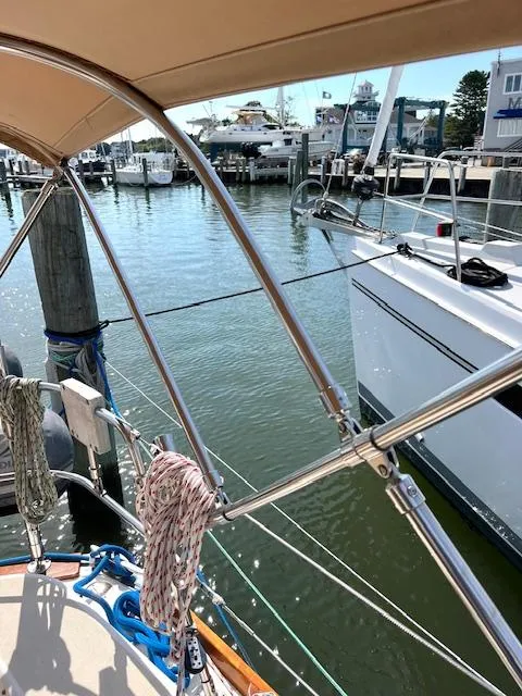 Slide: The Image of 1998 Tartan 4100 sailboat docked at marina, view from deck. - 38