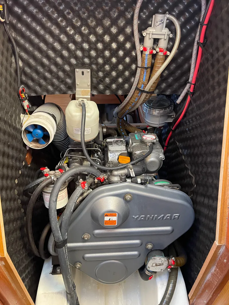 Slide: The Image of Yanmar engine in a 2008 Jeanneau 39i sailboat, featuring insulated compartment. - 35