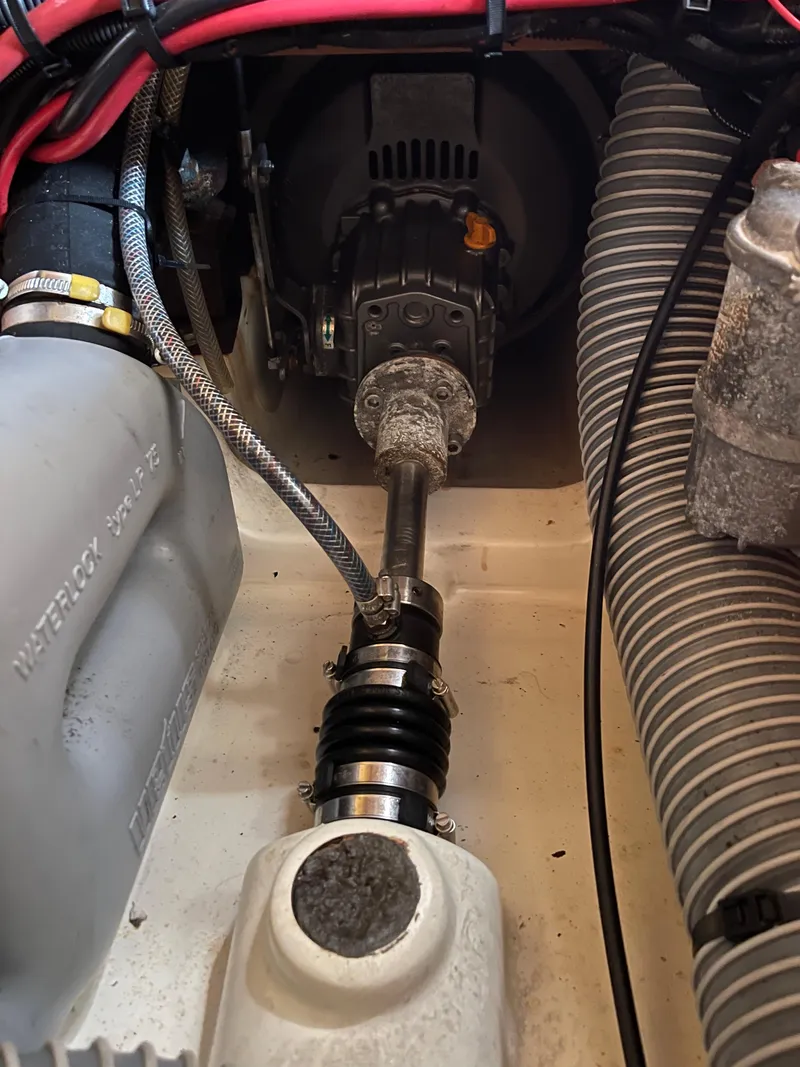 Slide: The Image of Engine compartment of a 2008 Jeanneau 39i sailboat, showing mechanical components and wiring. - 36