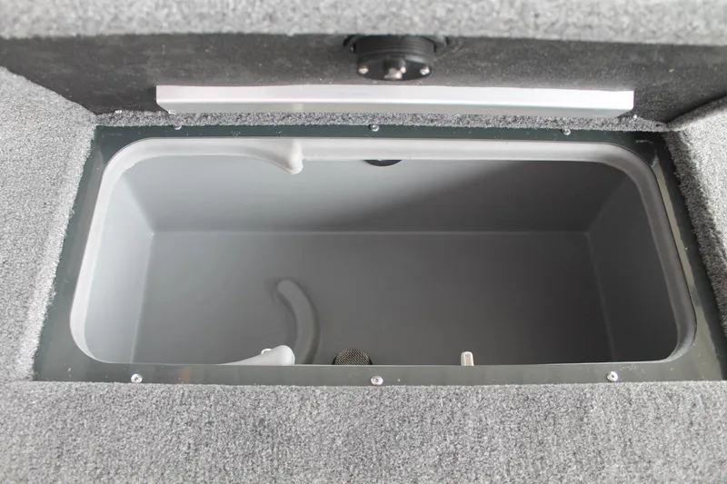 Slide: The Image of 2024 Ranger RT188C boat storage compartment, gray interior, open lid. - 20