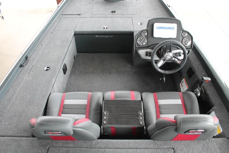 Slide: The Image of 2024 Ranger RT188C boat interior with steering console and dual seats. - 5