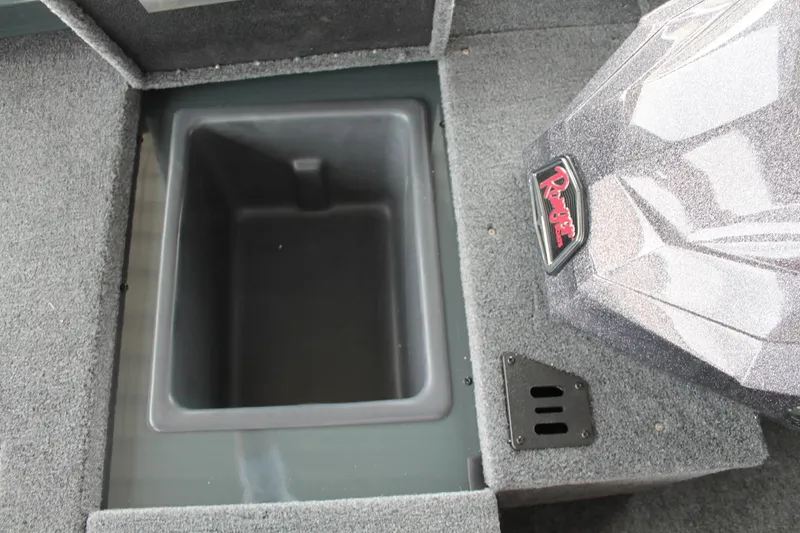 Slide: The Image of 2024 Ranger RT188C boat storage compartment with carpeted interior. - 7