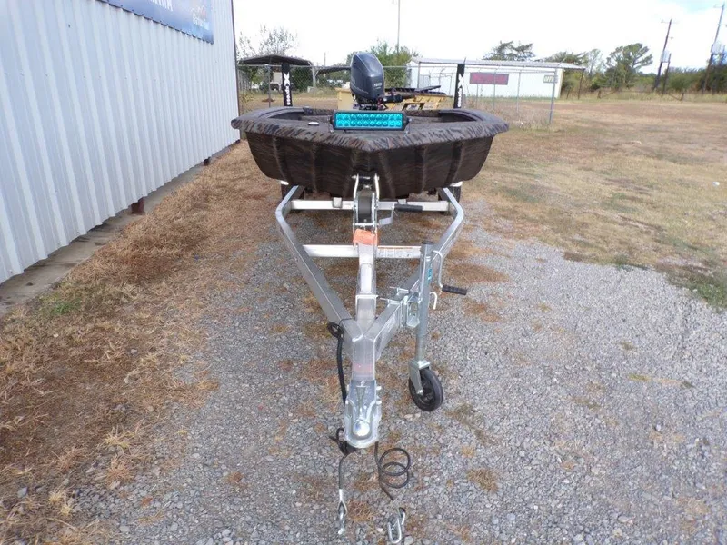 Slide: The Image of 2025 Xpress XTS16 boat trailer on gravel, featuring sturdy metal frame and hitch. - 10