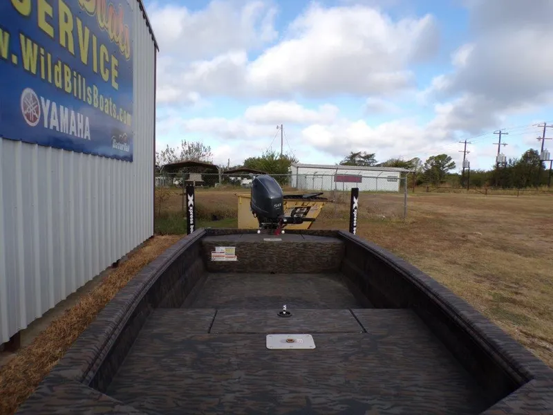 Slide: The Image of 2025 Xpress XTS16 boat at Wild Bill's Boats, featuring Yamaha engine. - 9