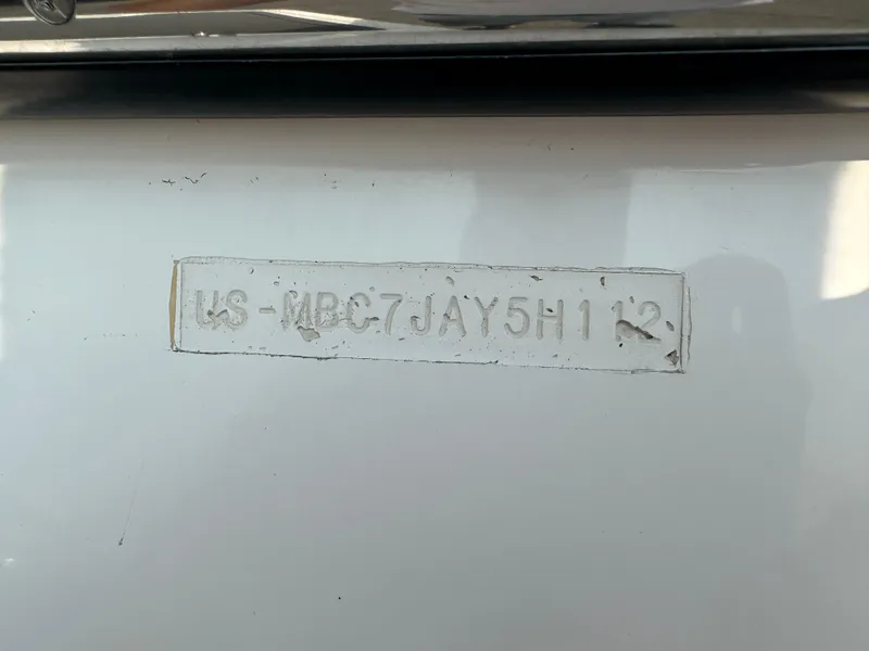 Slide: The Image of Hull identification number on 2012 MasterCraft X45 boat. - 12