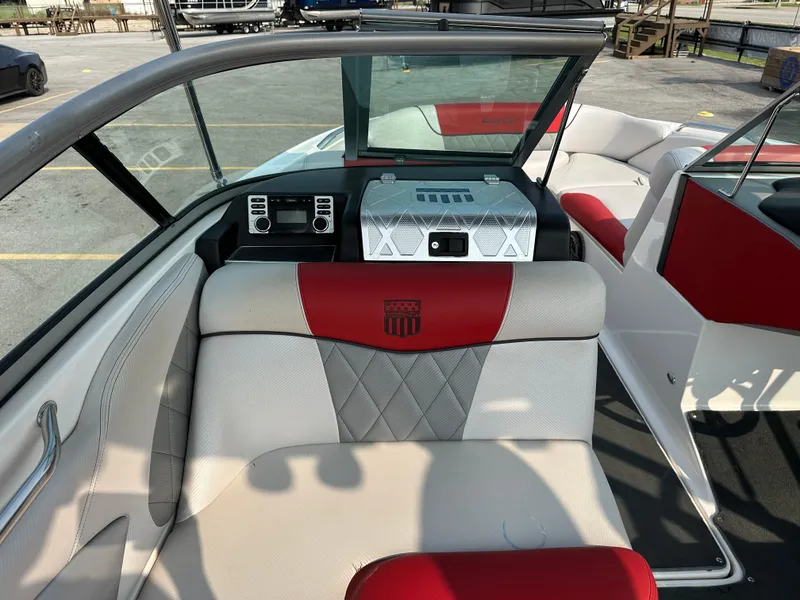 Slide: The Image of Interior of 2012 MasterCraft X45 boat with red and white seating. - 22