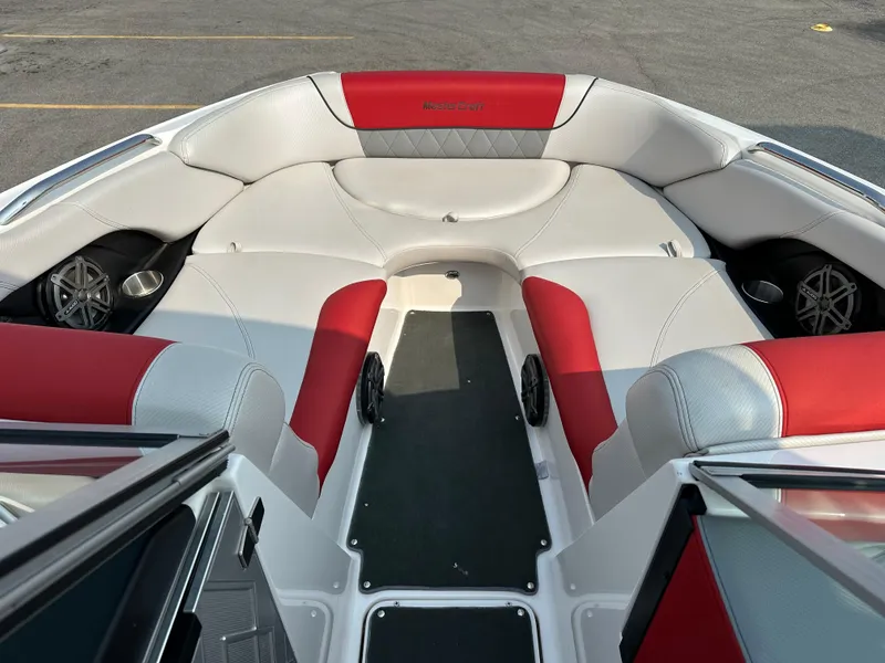 Slide: The Image of 2012 MasterCraft X45 boat interior with red and white seating. - 23