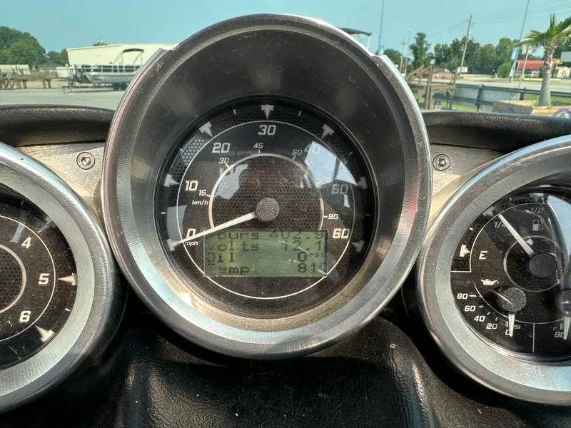 Slide: The Image of Close-up of 2012 MasterCraft X45 boat dashboard gauges. - 28