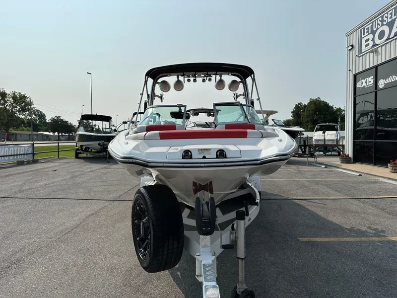 Slide: The Image of 2012 MasterCraft X45 boat on trailer at dealership lot. - 3