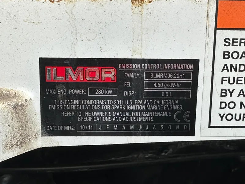 Slide: The Image of Ilmor engine label on 2012 MasterCraft X45, 280 kW, 6.0L, emission control details. - 8