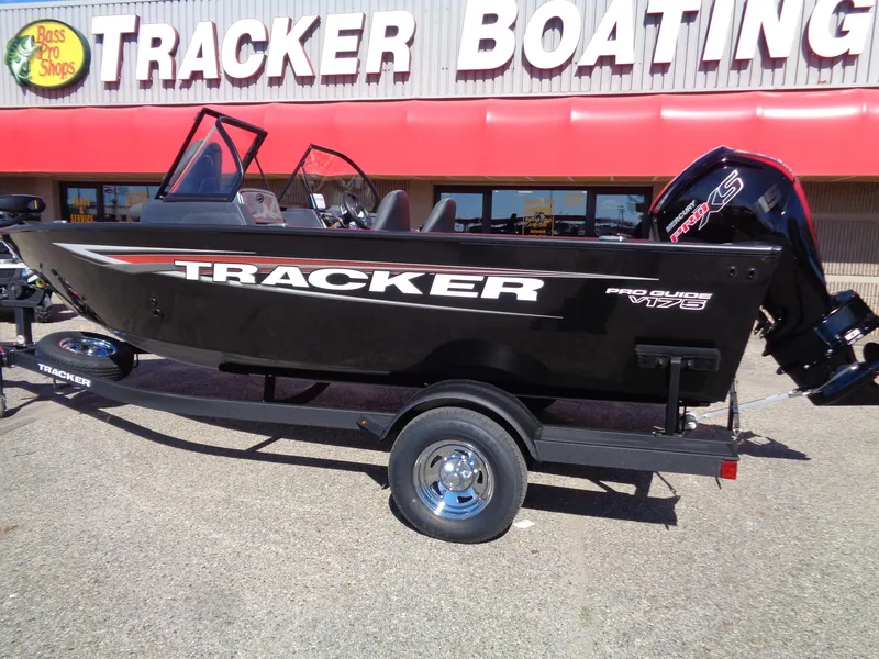 Slide: The Image of 2025 Tracker Pro Guide V-175 WT boat displayed at Tracker Boating store. - 2