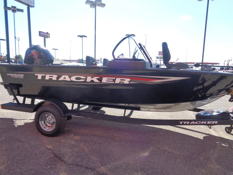 Slide: The Image of 2025 Tracker Pro Guide V-175 WT boat on trailer in parking lot. - 5