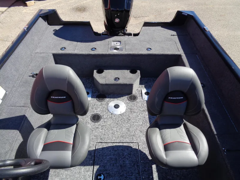 Slide: The Image of 2025 Tracker Pro Guide V-175 WT boat interior with two gray seats. - 8