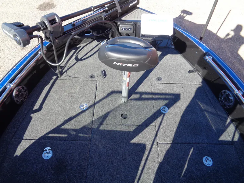 Slide: The Image of 2024 Nitro ZV20 Pro boat deck with fishing seat and equipment. - 12