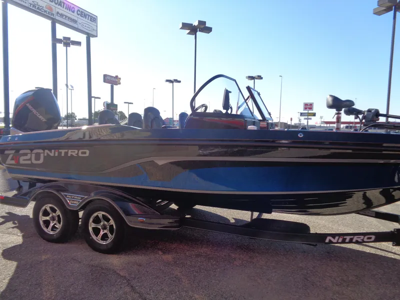 Slide: The Image of 2024 Nitro ZV20 Pro boat on trailer in outdoor dealership lot. - 5