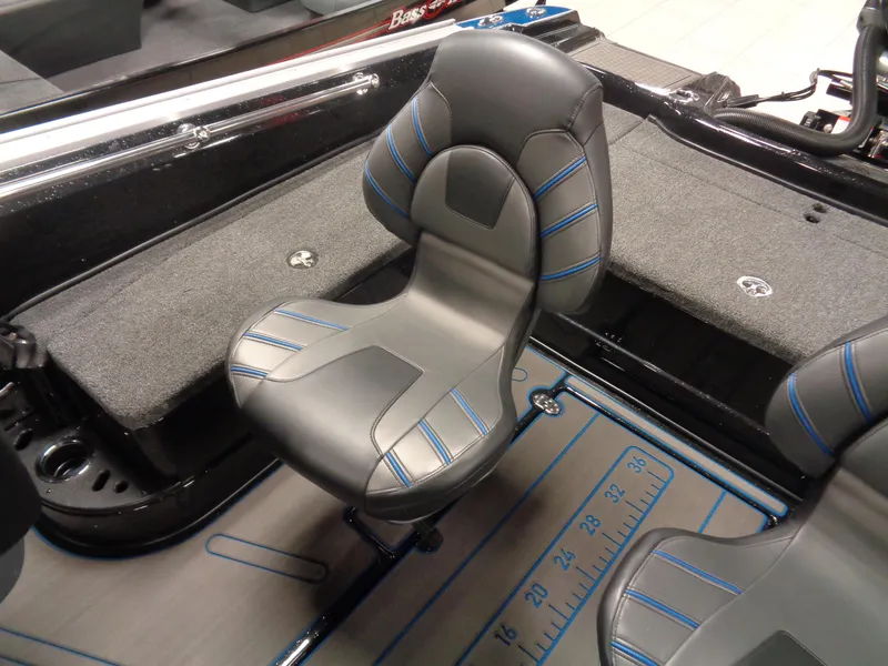 Slide: The Image of 2024 Nitro ZV20 Pro boat interior with cushioned seating and measurement markings. - 8