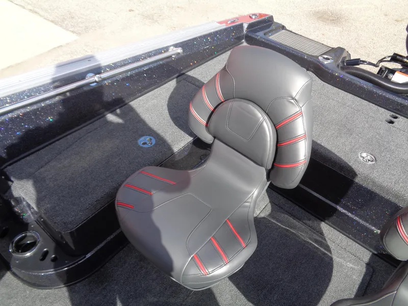 Slide: The Image of 2024 Nitro ZV20 Pro boat seat with black and red design. - 14