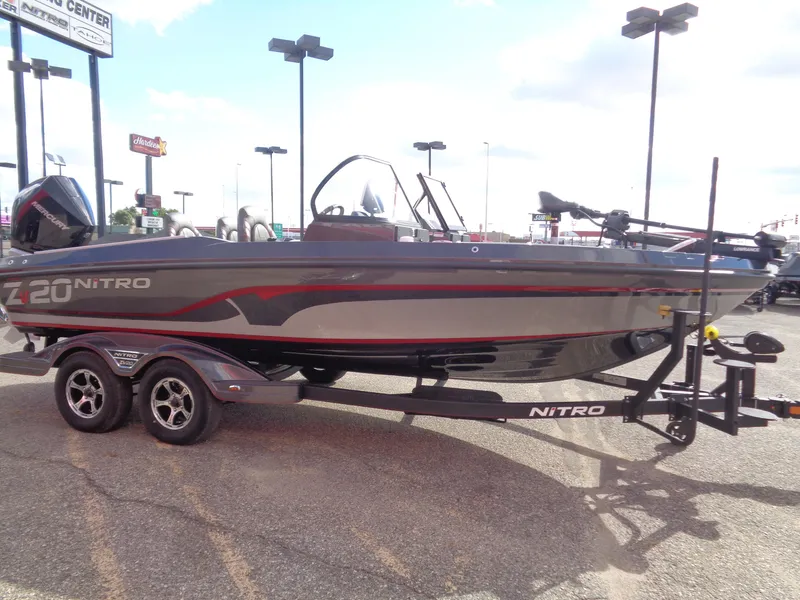 Slide: The Image of 2024 Nitro ZV20 Pro boat on trailer in parking lot. - 4