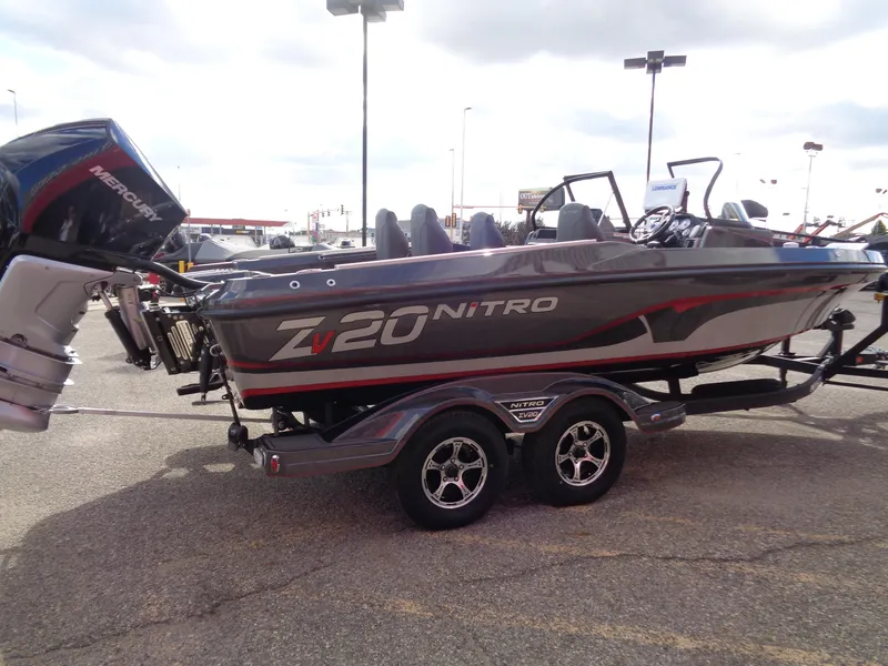 Slide: The Image of 2024 Nitro ZV20 Pro boat with Mercury engine on trailer. - 5