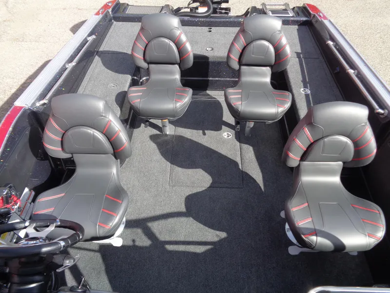 Slide: The Image of 2024 Nitro ZV20 Pro boat interior with four black and red seats. - 6
