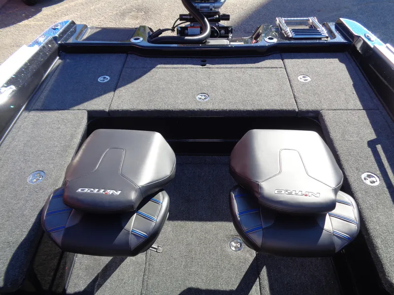 Slide: The Image of 2024 Nitro ZV20 Pro boat interior with dual seats and storage compartments. - 14