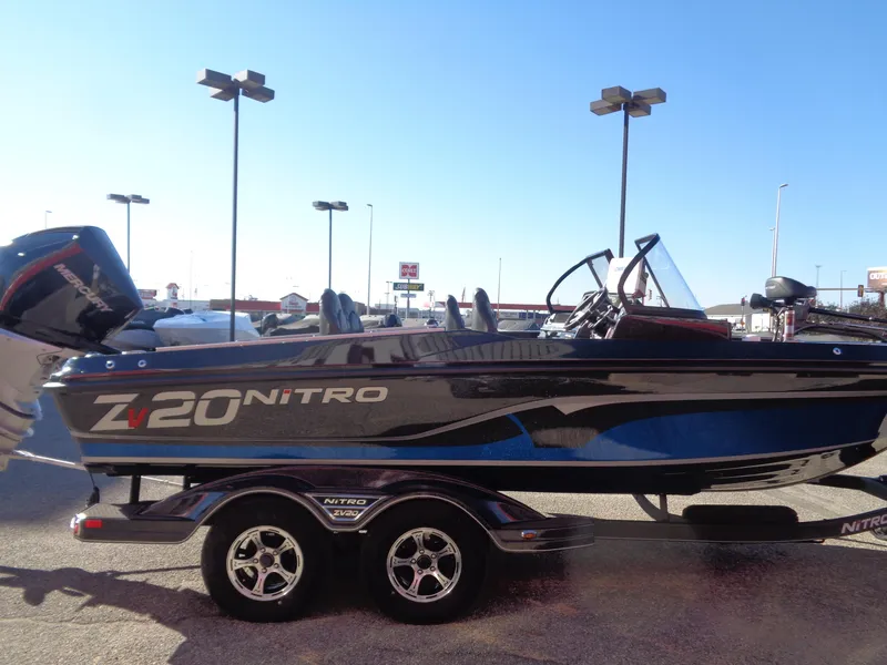 Slide: The Image of 2024 Nitro ZV20 Pro boat on trailer, side view, outdoors. - 4