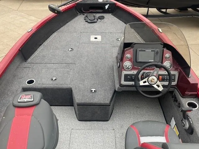 Slide: The Image of 2024 Ranger VS1782SC Angler boat interior with steering console and seating. - 2