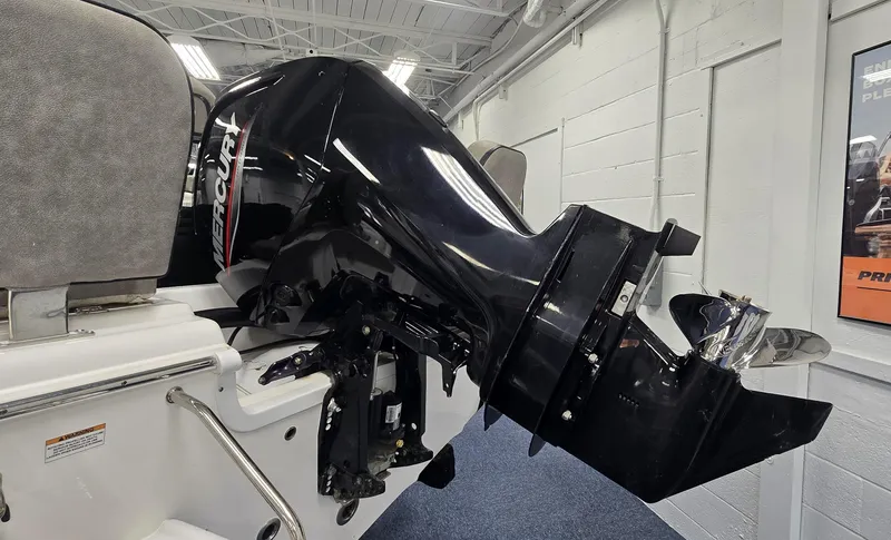 Slide: The Image of 2022 Sea Pro 199 Center Console with Mercury outboard motor in showroom. - 4