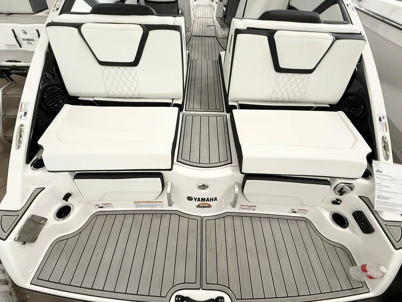 Slide: The Image of 2025 Yamaha Boats 252SD interior with sleek seating and modern design. - 2