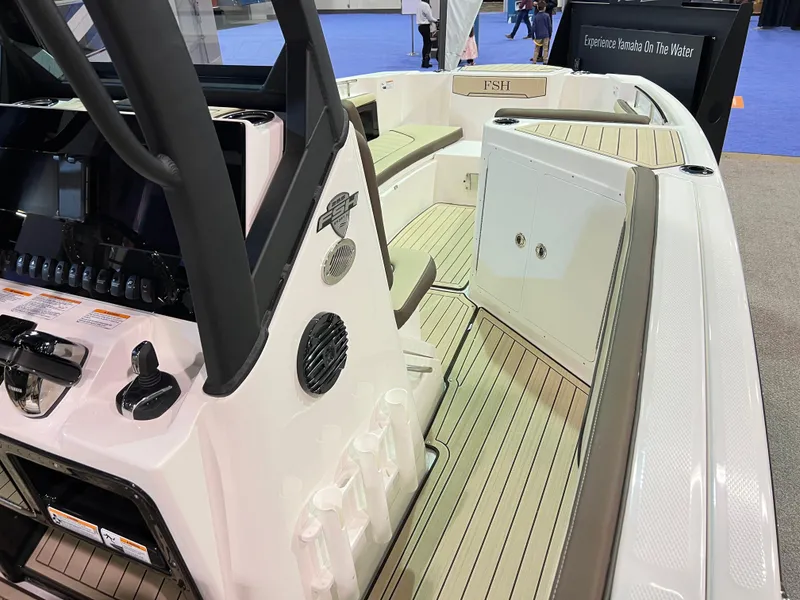 Slide: The Image of 2025 Yamaha Boats 255 FSH Sport H interior with sleek design and advanced controls. - 6