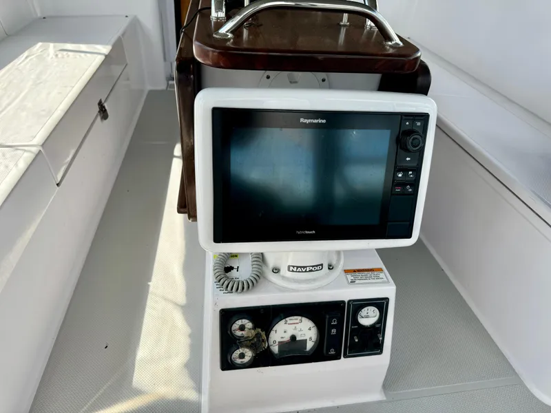 Slide: The Image of 12" Chartplotter and Engine Controls - 11