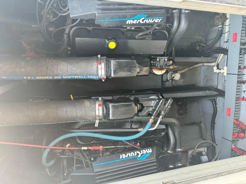 Slide: The Image of Engine compartment of a 1995 Sea Ray 370 Express Cruiser with MerCruiser engines. - 39