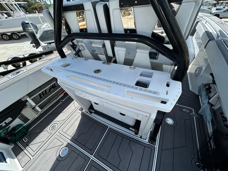 Slide: The Image of 2019 Blackfin 272 CC boat interior with fishing station and seating. - 6